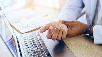 Buy stock photo Person, laptop and hands with wrist pain, injury or carpal tunnel syndrome by office desk. Closeup of business employee with sore muscle, ache or joint inflammation from arthritis or strain on table