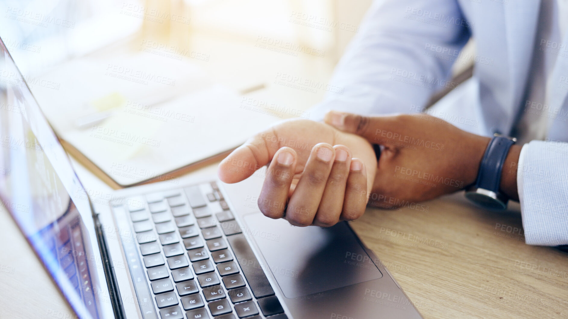 Buy stock photo Person, laptop and hands with wrist pain, injury or carpal tunnel syndrome by office desk. Closeup of business employee with sore muscle, ache or joint inflammation from arthritis or strain on table