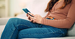 Sofa, home and hands typing on smartphone chat, social media or networking connection on mobile app, internet or house. Teenager girl or woman with cellphone technology texting message in lounge