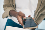 Person, hand and phone for social media, communication or online networking at office. Closeup of employee on mobile smartphone for chatting, texting or research on app, web or search at workplace