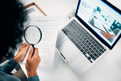 Buy stock photo Magnifying glass, computer and woman reading cv in office for company recruitment website. Research, technology and closeup of female designer with hiring paperwork and laptop in workplace.