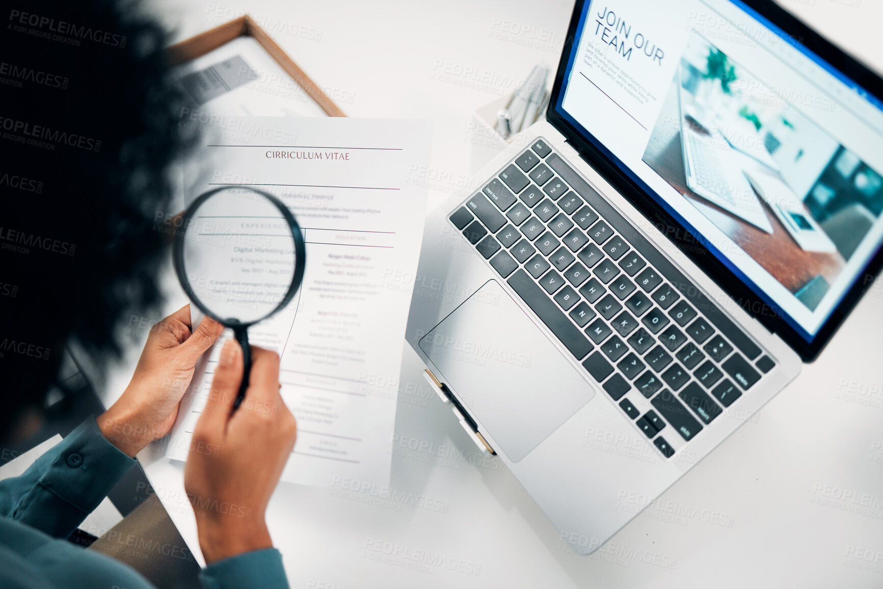 Buy stock photo Magnifying glass, computer and woman reading cv in office for company recruitment website. Research, technology and closeup of female designer with hiring paperwork and laptop in workplace.