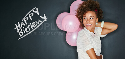 Buy stock photo Black woman, balloons and studio with happy birthday in chalk, words or text with celebration isolated on blackboard background. Mockup, smile for special event and happiness with banner for party