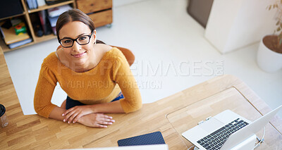 Buy stock photo Above, desktop and woman in office with project in creative workplace for web developer or coding. Happy, person and development of company website, app or programmer with laptop for productivity