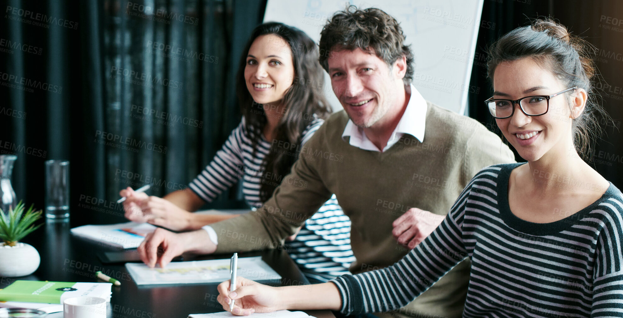 Buy stock photo Portrait, team and happy business people in meeting for coworking, about us or collaboration in startup. Face, group and smile of creative staff writing notes with manager, editor or workers together