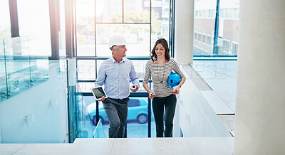 Buy stock photo Architect, man and woman on stairs in office for planning, decision or ideas in construction industry. Contractor, teamwork and partnership on steps for choice, question or development in real estate