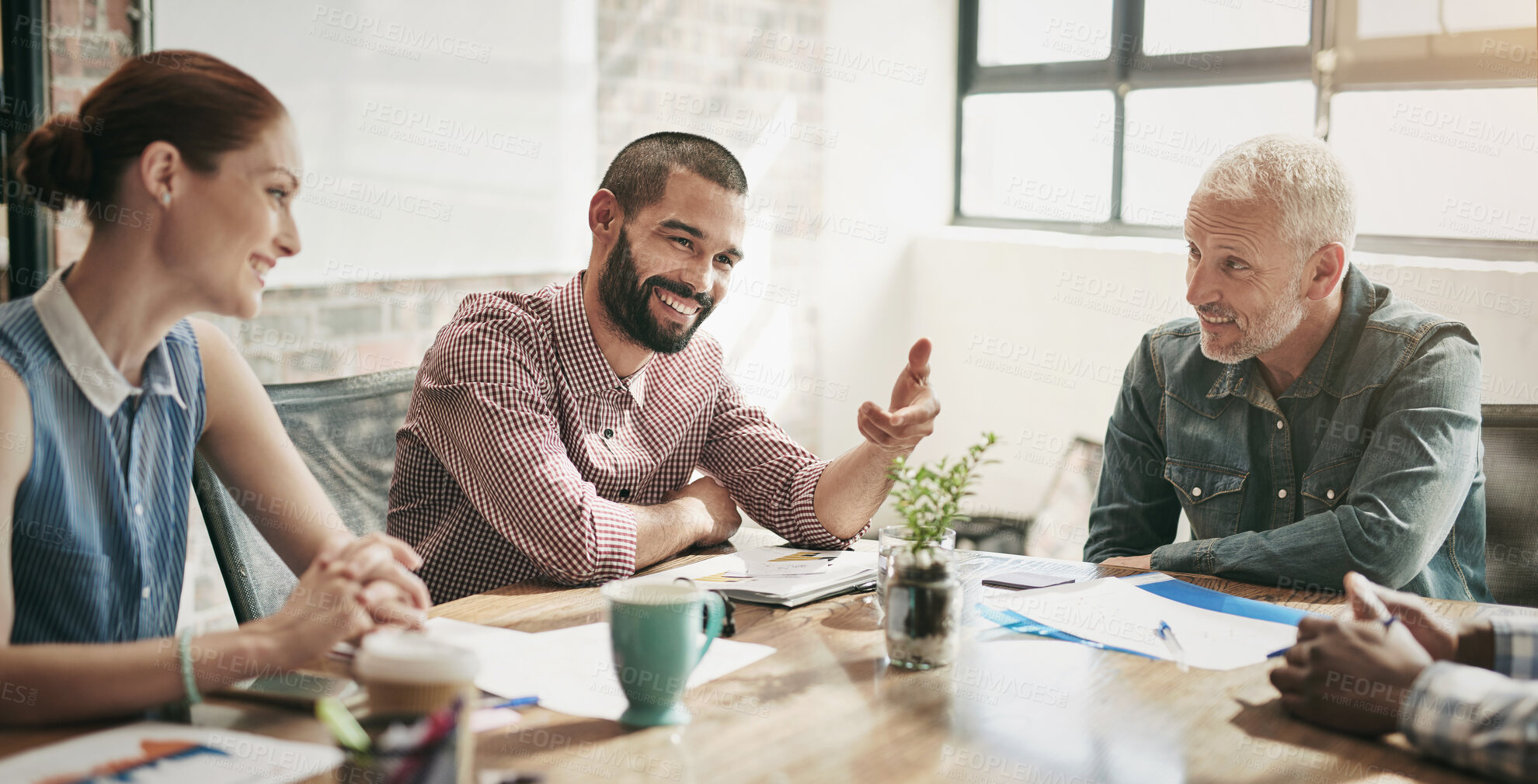 Buy stock photo Happy, creative people and meeting with documents in discussion for planning, brainstorming or ideas at office. Group of employees or team with smile or paperwork for conversation, design or startup