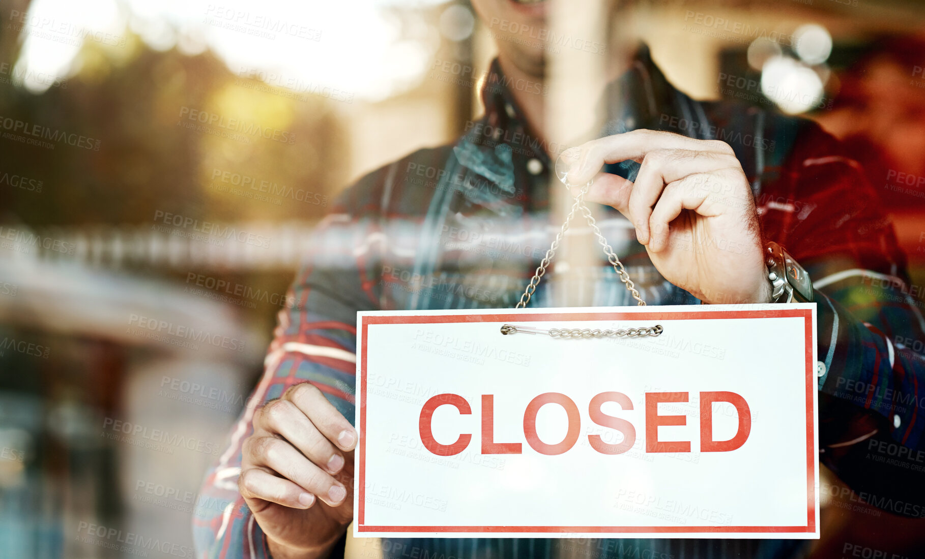 Buy stock photo Closed, sign and man at door of cafe for small business, information and notification of service. Coffee shop, waiter and person with board by window for hospitality, restaurant and end of work day