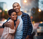 Happy couple, portrait and hug for city travel at night or downtown date for relationship, bokeh or evening. Man, woman and embrace in New York for holiday adventure or sightseeing, love or marriage