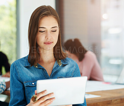 Buy stock photo Woman, creative and research with tablet in meeting for browsing, design or development at office. Young female person or employee working on technology in online startup, agenda or task at workplace