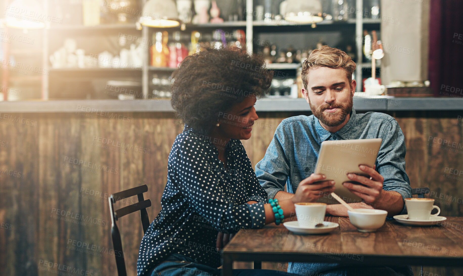 Buy stock photo Smile, man and woman in cafe with tablet, social media, relax and networking connection at table. Date, weekend conversation and happy couple in coffee shop with digital app, drink and online search