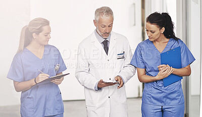 Buy stock photo Mature man, nurse or doctor with tablet in hospital corridor with feedback, review or research on anti aging pills. Medical expert, interns or clipboard for briefing on metformin or health treatment