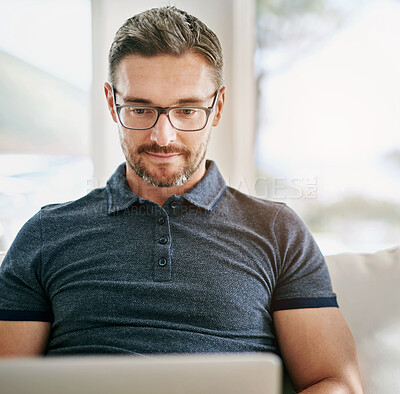 Buy stock photo Happy, businessman and thinking with laptop at home for remote work for freelance writing on sofa. Male person or copywriter and glasses with computer typing for creative project or online blog