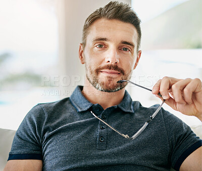 Buy stock photo Portrait, thinking and vision with mature man on sofa in living room of home for contemplation. Face, future and glasses with confident person in apartment for planning or thoughtful mindset