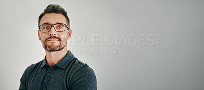 Buy stock photo Face, space and thinking with mature man on gray wall background for future, planning or vision. Idea, mockup or question and person with beard in glasses for contemplation or problem solving