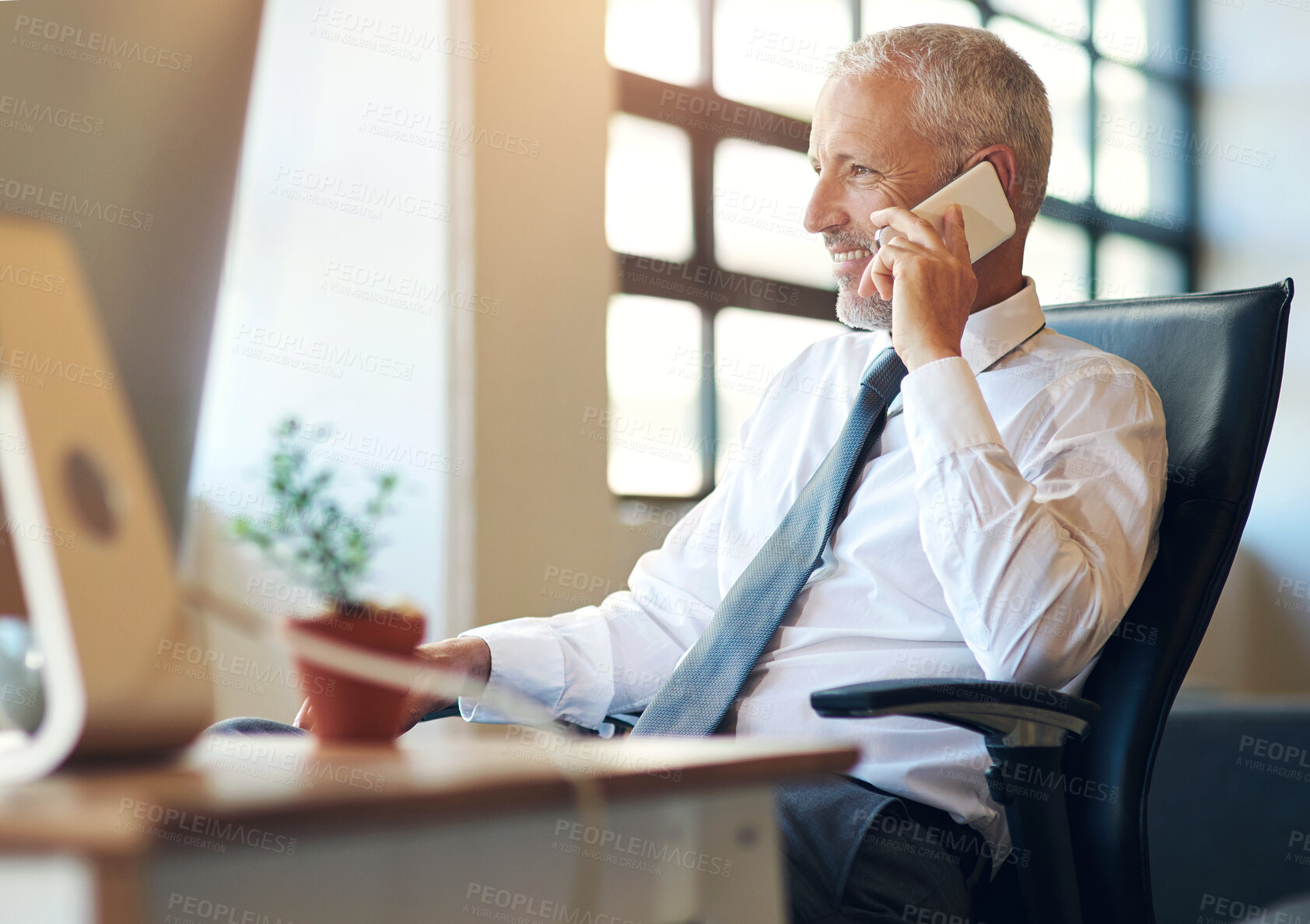 Buy stock photo Mature businessman, CEO and phone call in office with networking for financial deal or negotiation. Executive, corporate employer or happy with smartphone for investment contact or trading discussion