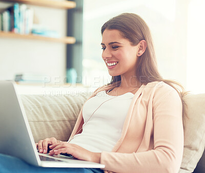 Buy stock photo Happy, sofa and woman on laptop online for social networking, internet and remote work. Working from home, relax and person typing on computer for website, research project or proposal in living room