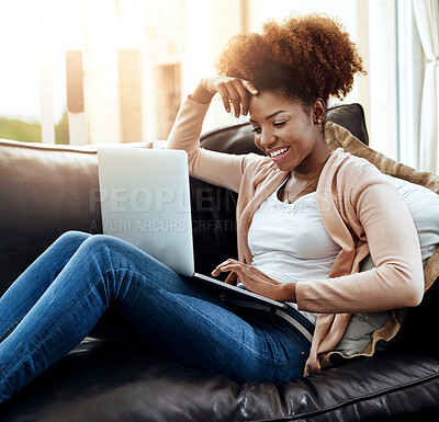 Buy stock photo Happy, african woman or student with laptop on sofa for remote learning, study or online education at home. Female person, computer and smile in living room for easy homework, project or information