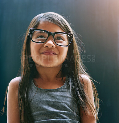 Buy stock photo Smile, glasses and girl in studio with eye care for optometry, prescription and happiness. Youth, kid and frame of spectacles with lens on black background for clear vision, confidence and eyesight