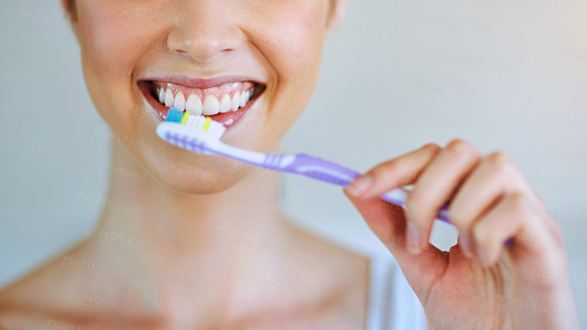 Buy stock photo Dental, mouth and woman brushing teeth in bathroom for oral care, hygiene or fresh breath on white background. Tooth, cleaning and girl with toothbrush, product or toothpaste for bacteria prevention