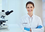 Portrait, science and woman with arms crossed, research or breakthrough with microscope, test or medical. Face, person or employee with biotech, scientist or equipment with vaccine or career ambition