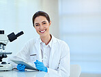 Portrait, science and woman in lab, tablet and research for breakthrough, microscope or medical. Face, person or employee with biotech, scientist or future engineering with vaccine, test or analytics