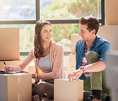 Buy stock photo Happy, couple and box with documents in home for mortgage loan, real estate and property agreement. Man, woman and love with smile on floor for new house, investment and signature of paperwork