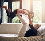 Home, mother and kid with airplane on sofa for playful fun, funny bonding and care on mothers day. Family, woman and girl with game in living room for entertainment, child development and motherhood