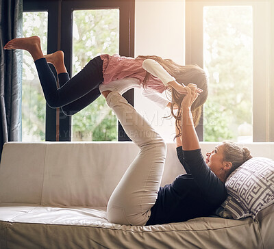 Buy stock photo Home, mother and kid with airplane on sofa for playful fun, funny bonding and care on mothers day. Family, woman and girl with game in living room for entertainment, child development and motherhood