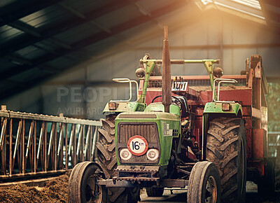 Buy stock photo Farm, machine and old tractor in barn with dirt, rust and dust in storage warehouse on land. Vintage, retro and plow truck in abandoned factory shed or tools for farming production or agriculture