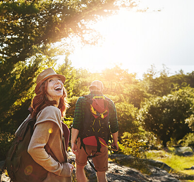 Buy stock photo Nature, hiking and couple walking on adventure holiday in mountain with trees, sun, and bush from back. Trekking, man and woman on travel vacation together in woods, forest or outdoor climbing park