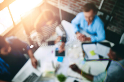 Buy stock photo Meeting, boardroom and teamwork in office with overhead, blurred and lens flare. Planning, strategy and documents for collages and design for creative agency, advertising and business people