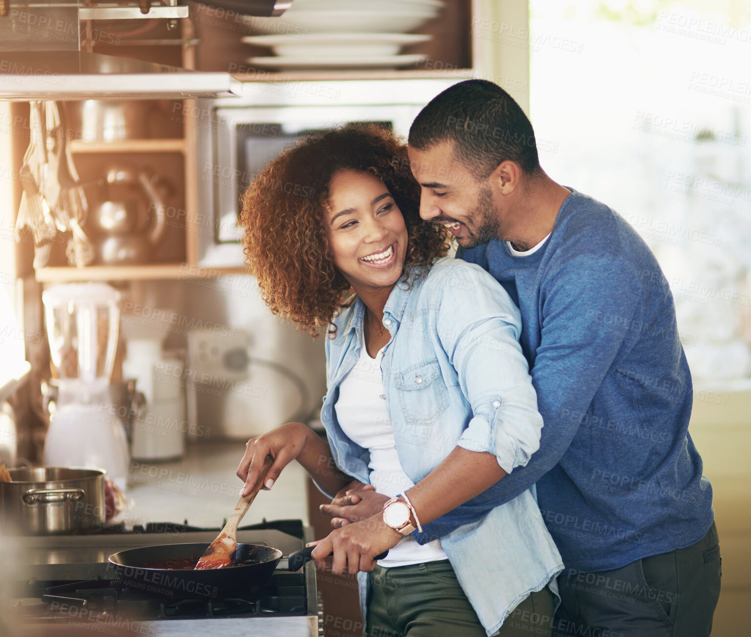 Buy stock photo Man, woman and cooking food by stove at kitchen counter as meal prep with romance, marriage or love. Happy couple, pan and hug in home apartment or together for nutrition bonding, hungry or morning