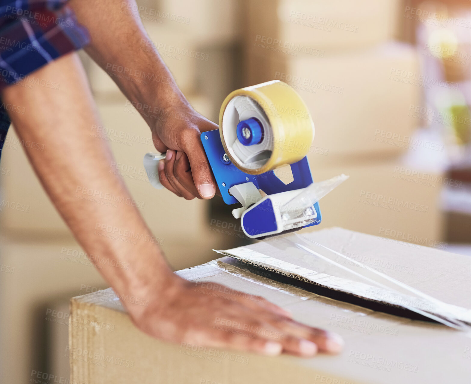Buy stock photo Man, closeup and moving with boxes and tape for real estate, closing container for safety. Male person, zoom and relocation to new home with packaging, job with roller for cardboard in America
