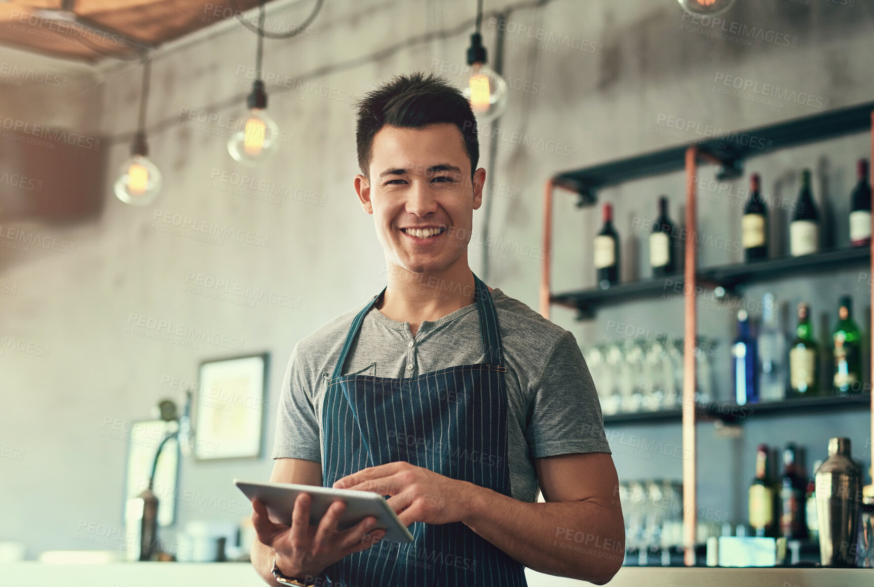 Buy stock photo Man, tablet and barista portrait in restaurant, typing and waiter for online review and inventory order for business. Communication, planning and information search, happy and contact suppliers