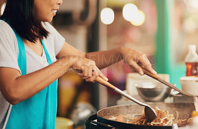 Buy stock photo Woman, food market and cooking with Thai dish, vendor and prepare meal with utensils, ingredients or informal business. Traditional, street chef or entrepreneur with culture, startup or fried cuisine