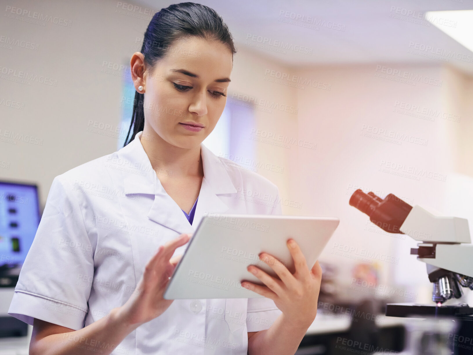 Buy stock photo Woman, scientist and online on tablet in laboratory for daily schedule, biotechnology and experiment planning for study or tests. Girl, digital technology and internet for chemistry breakthrough.