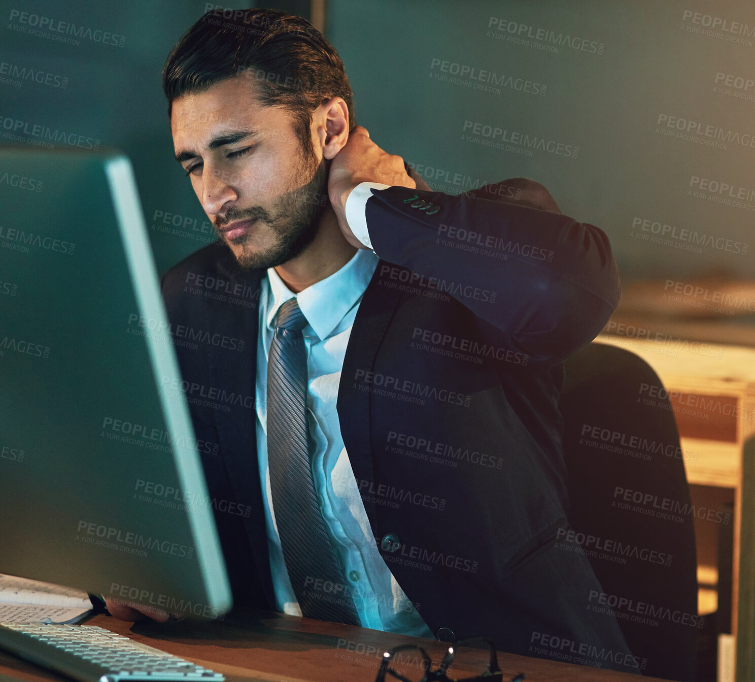 Buy stock photo Night, business and man with neck pain, stress and overworked with professional, inflammation and injury. Person, evening and consultant with computer, burnout and  emergency crisis with fibromyalgia
