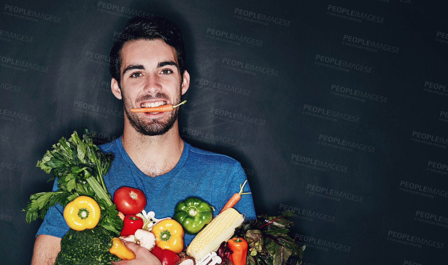 Buy stock photo Man, portrait and studio with vegetables for health or nutrition, vegan with diet for wellness. Male person, groceries and black background for announcement with food or shopping, happy with herbs