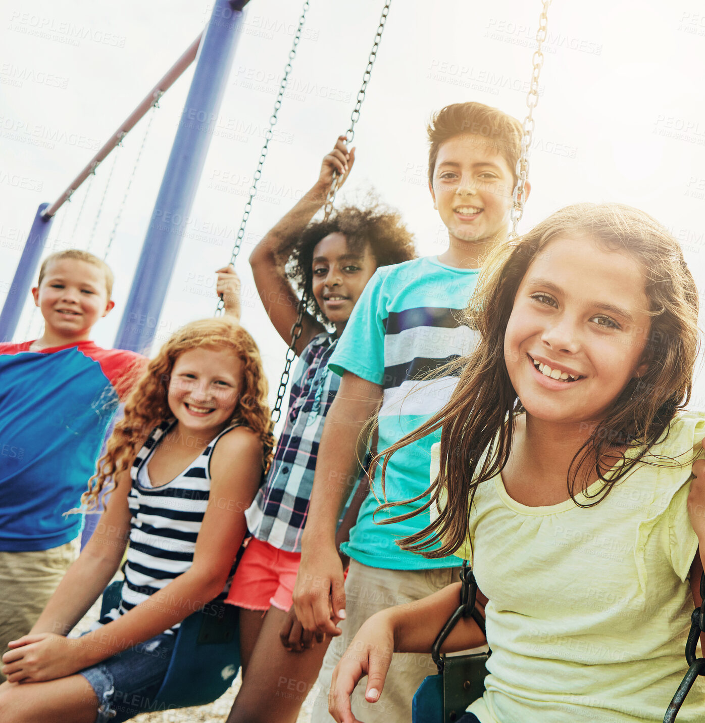 Buy stock photo Happy, child and portrait with friends on swing for playground fun, bonding together and support. Sunshine, kids and playing at park for summer break, holiday activity and relationship development