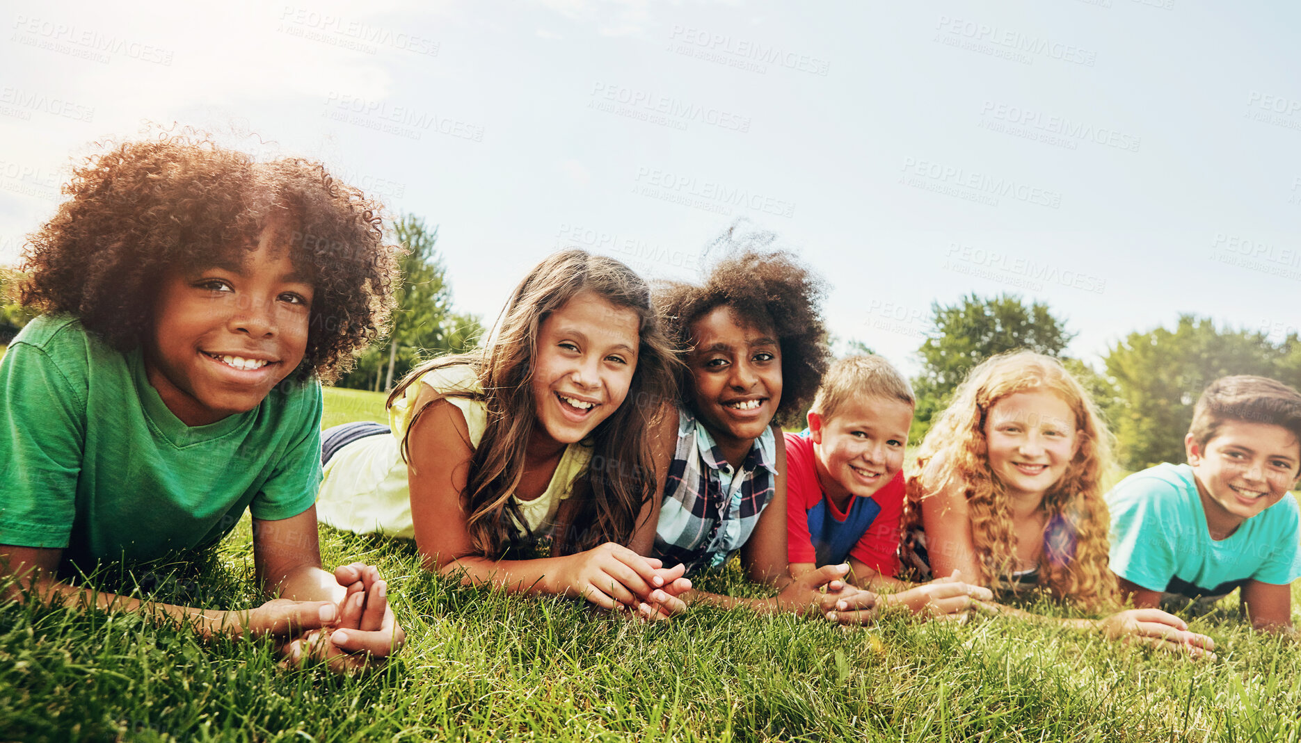 Buy stock photo Friends, grass and portrait of children in park for outdoor adventure, bonding or school trip. Diversity, student and kids with smile in nature for connection, friendship or holiday in Washington dc