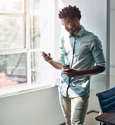 Buy stock photo Office, window and black man with phone, coffee and scroll on social media, email or online chat. Networking, schedule and creative professional with smartphone for business connection with drink.