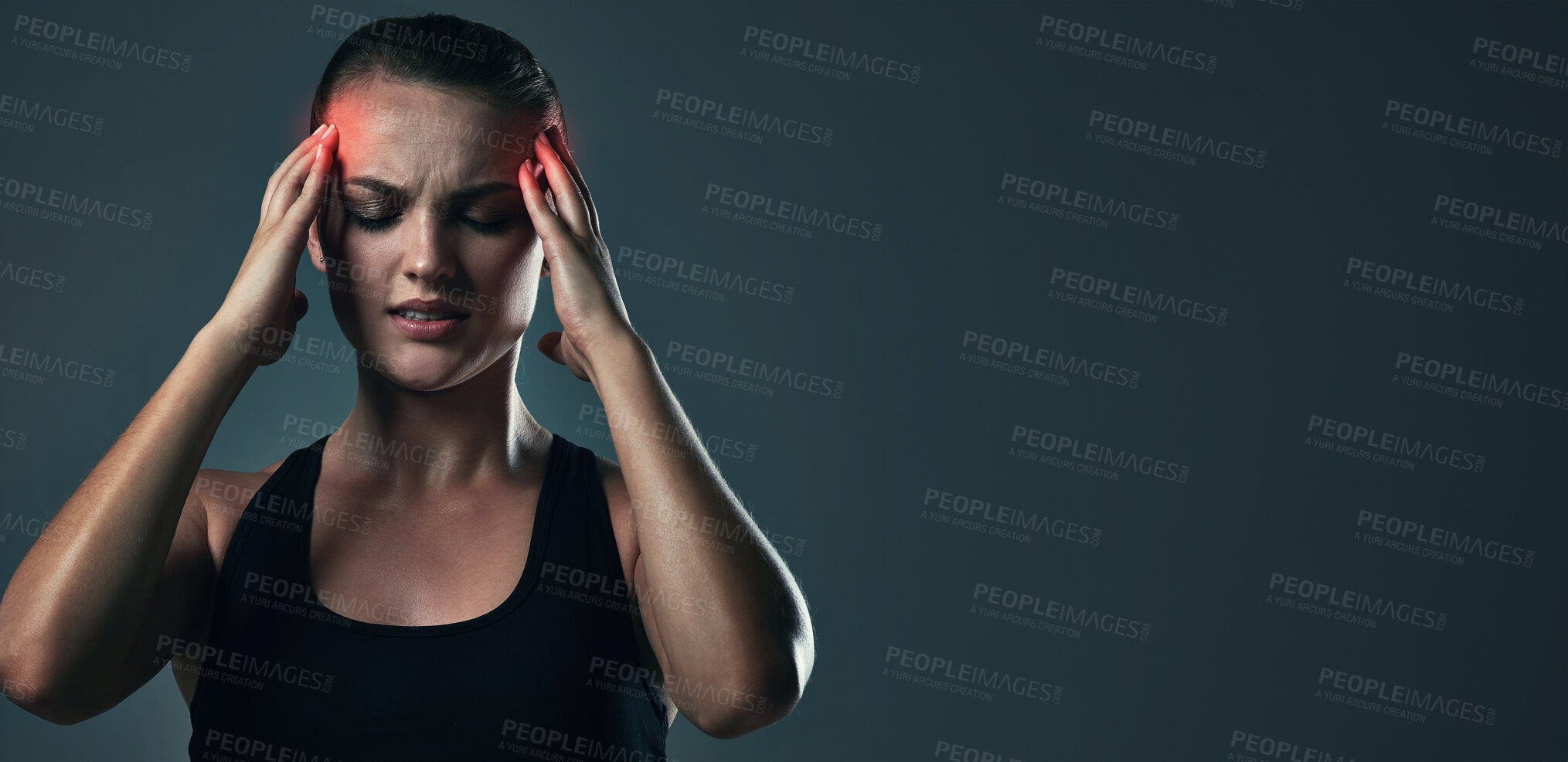 Buy stock photo Woman, headache and burnout on exercise in studio on dark background with head pain or inflammation. Female person, mockup and fatigue from fitness, workout and training for health with red glow