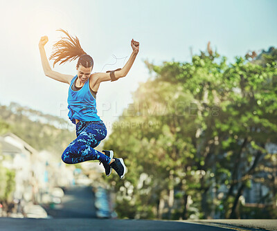 Buy stock photo Woman, street and fitness with jump for celebration, speed and progress with training in summer. Girl, person or runner with cheers, winning and success for workout goals on road with achievement