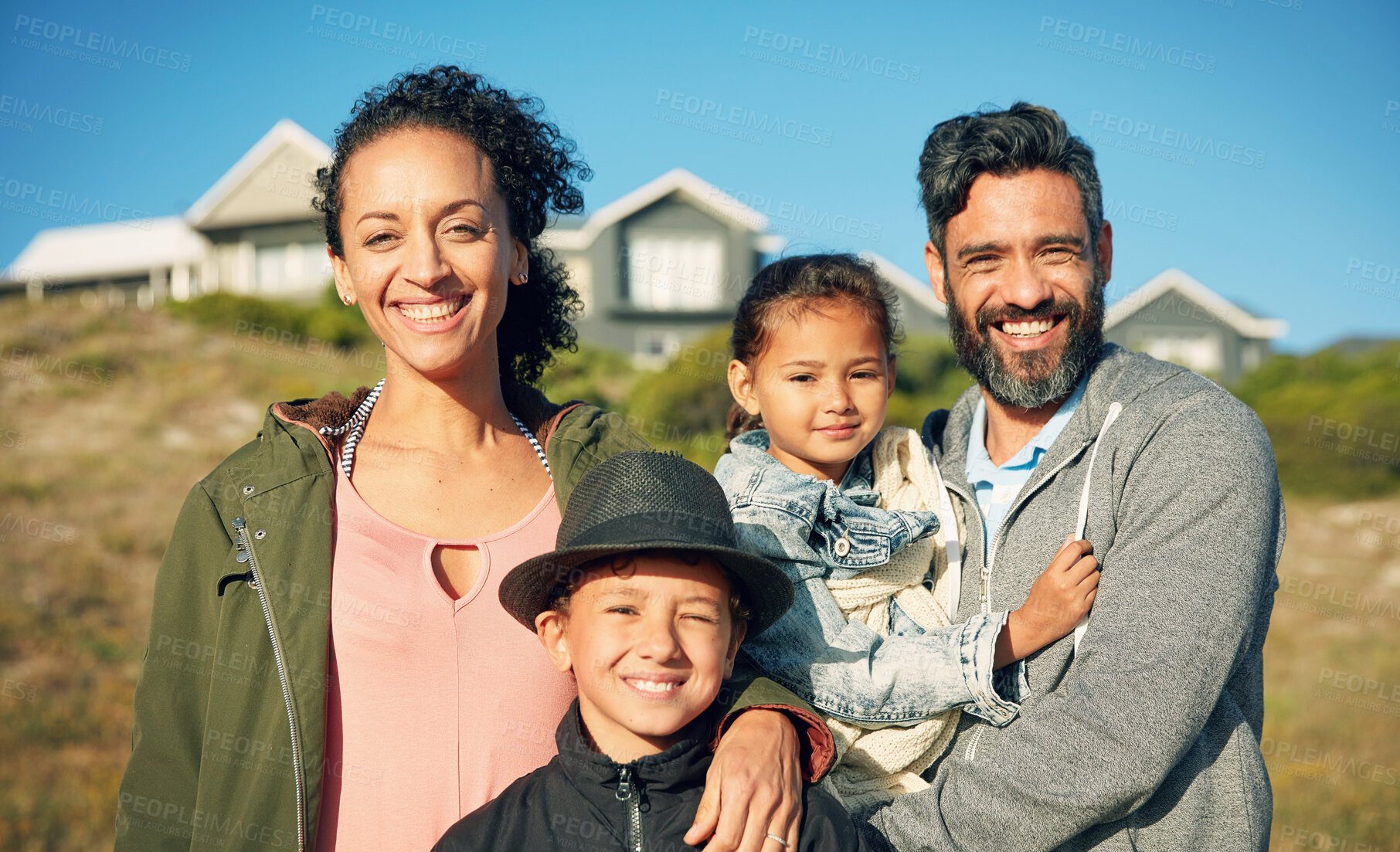 Buy stock photo Holiday, house and outdoor portrait of family with smile, nature and bonding together on travel adventure. Mom, dad and children on summer vacation in backyard with blue sky, happy face and sunshine