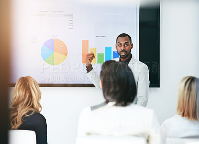 Buy stock photo Black man, coaching and chart with screen for presentation, meeting or corporate statistics at seminar. Businessman, manager or speaker talking to employees on company revenue, growth or profit