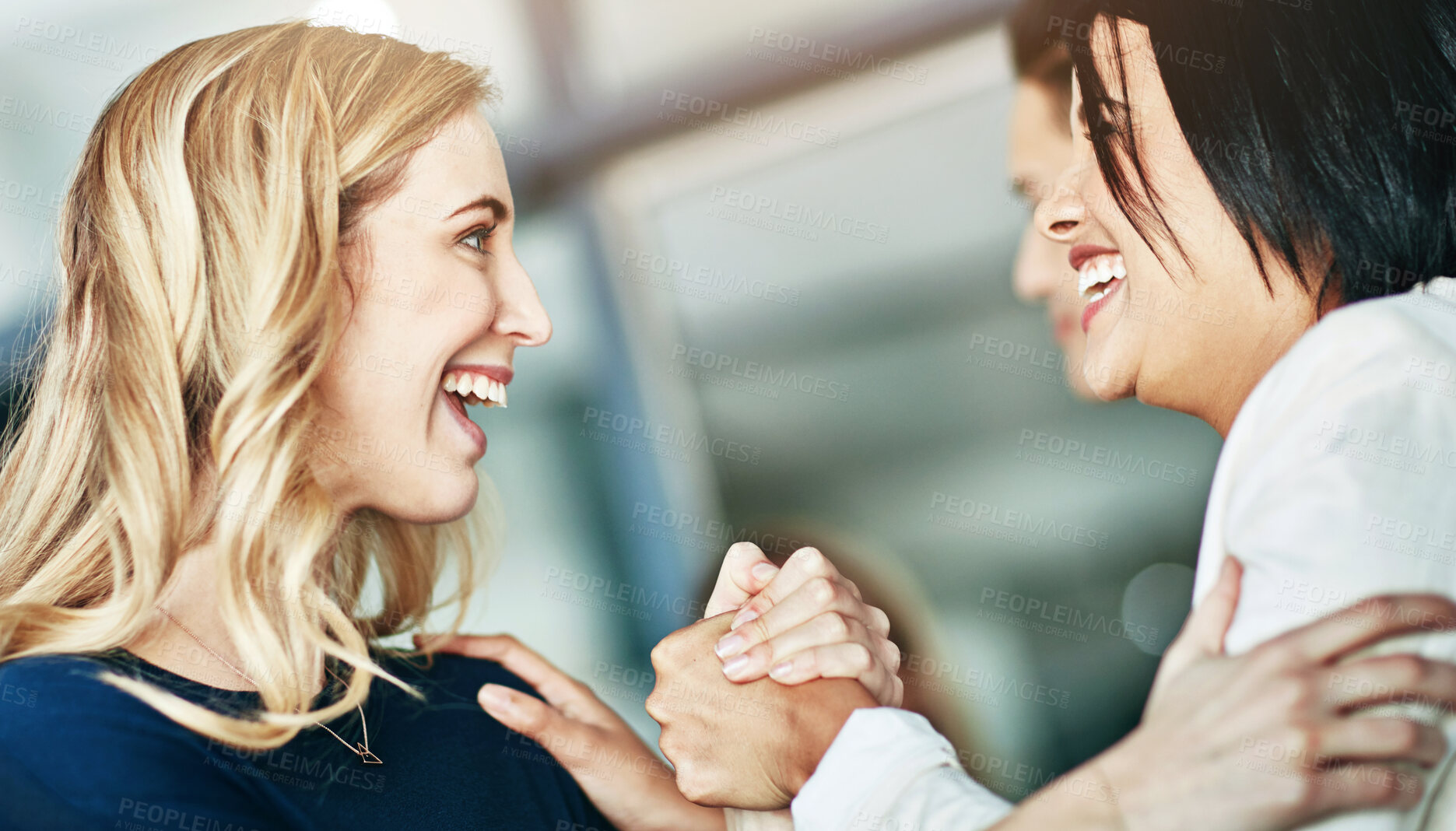 Buy stock photo Business, women and holding hands for unity in office with solidarity, teamwork and happy for partnership. Professional, employees and collaboration with laughing for funny motivation and equality