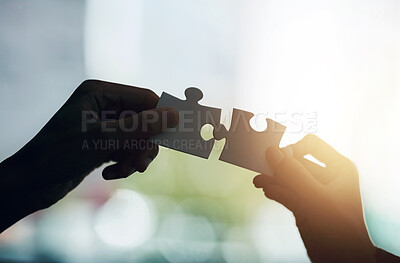 Buy stock photo Hands, puzzle and silhouette with connection for solution, teamwork or link with people in office. Jigsaw game, pieces and toys for synergy, collaboration or strategy for problem solving in workplace