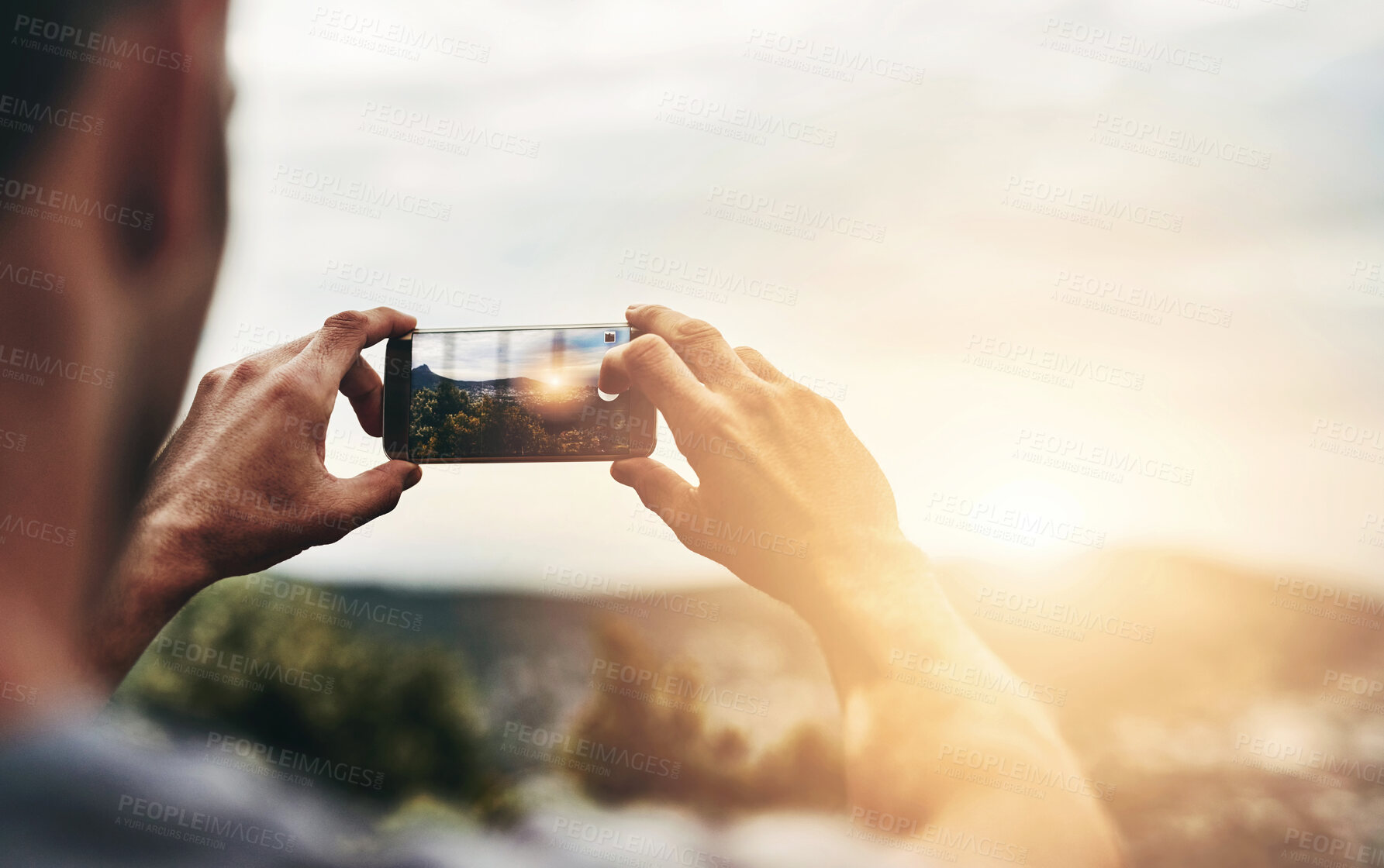 Buy stock photo Sunset, photography and hands of man with phone, screen and post on social media with nature, landscape or sun. Cellphone, photo and person with tech for memory of vacation, holiday or outdoor view