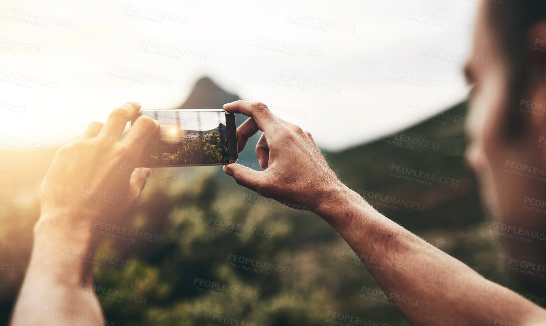 Buy stock photo Sunset, photography and hands of man with phone, screen and post on social media with nature, landscape or sun. Cellphone, photo and person with tech for memory of vacation, holiday or mountain view